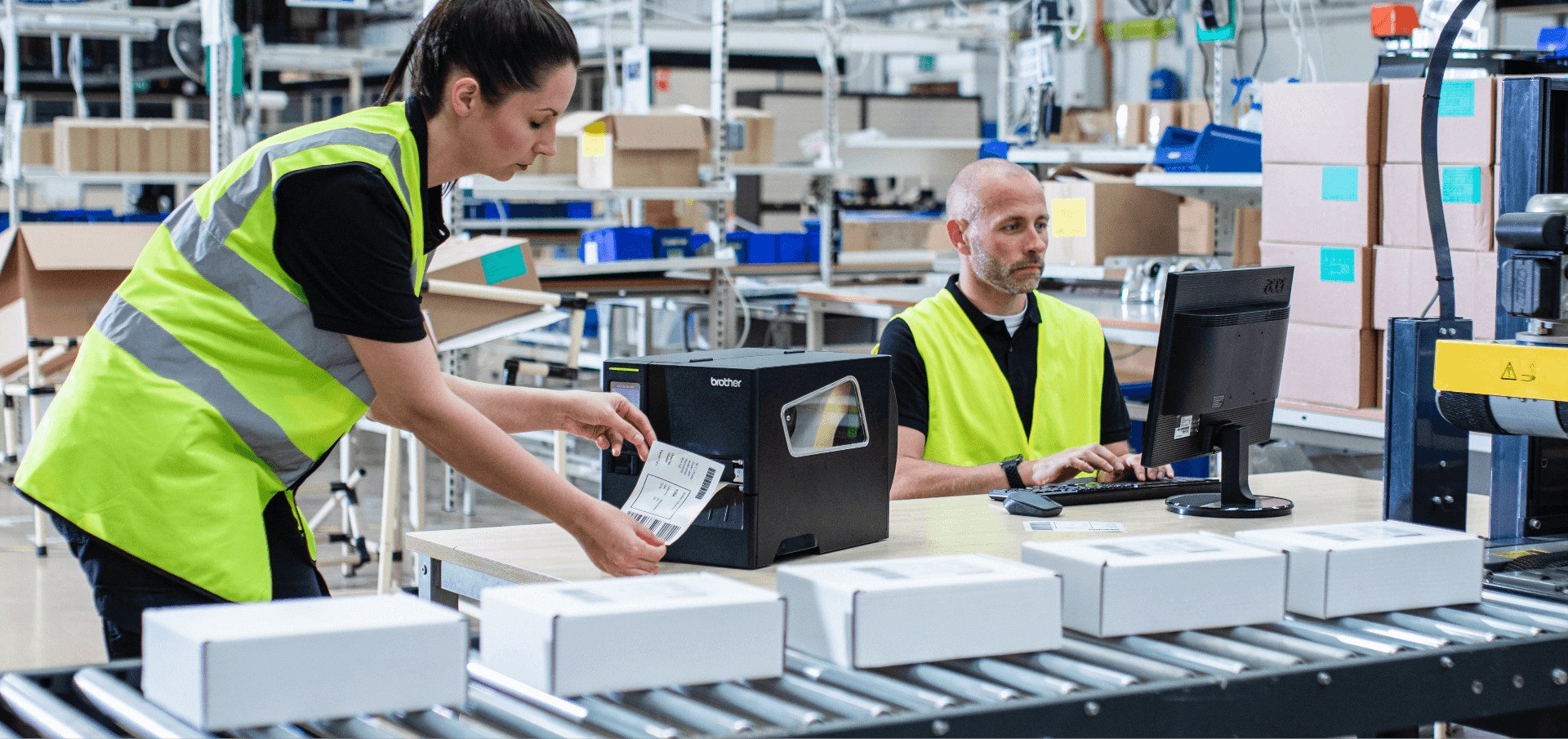 Two Warehouse Employees Using Brother Titan Industrial Printer to Print Shipping Labels