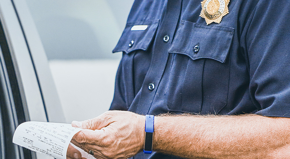 Close up of officier's hands preparing an ecitation