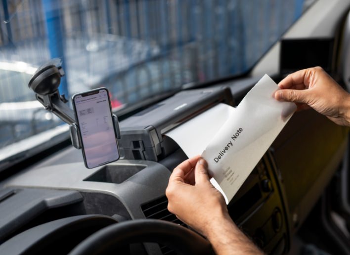 PocketJet Mobile printer mounted on dashboard