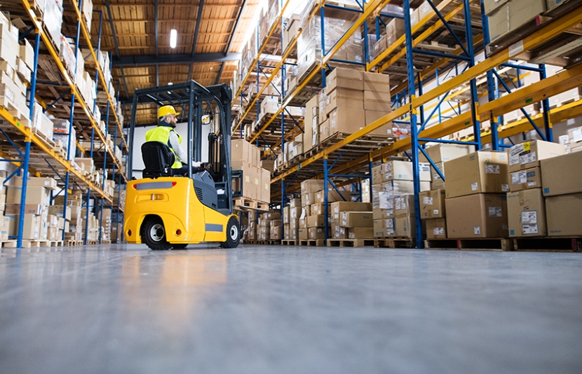 Warehouse worker on forklift