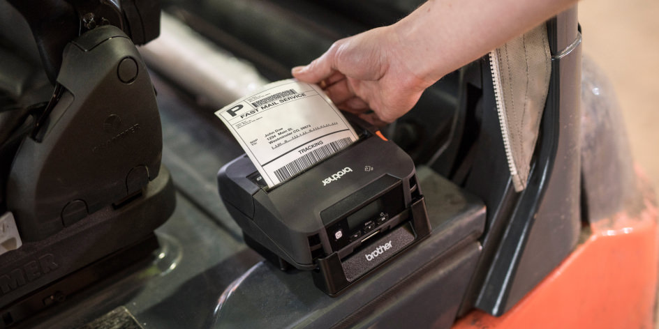 Shipping label being printed from forklift