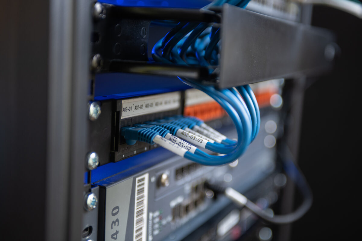 Audio visual rack showing cables with wrap around self-laminating labels