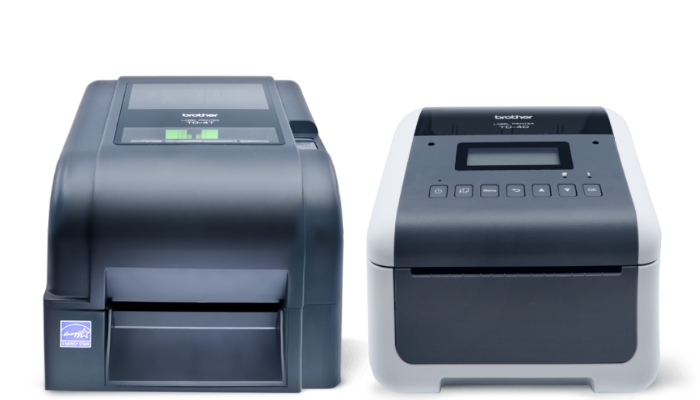 Two modern label printers side by side on a white background, both with digital displays.